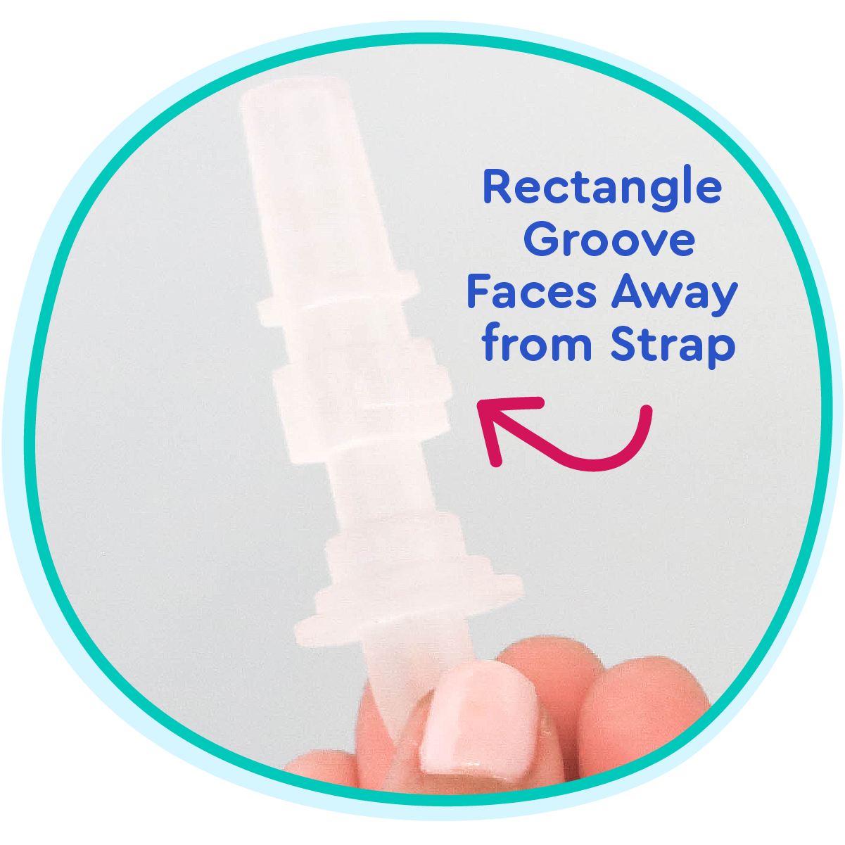 Close-up of a product with text indicating the direction of a groove relative to a strap.